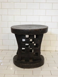 Carved checker stool - Benin